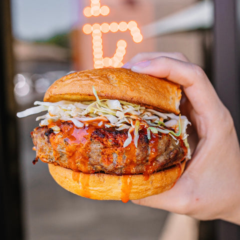 BACK! Buffalo Turkey Burger with Celery, Carrots, Gluten Free Bun, and Ranch Aioli