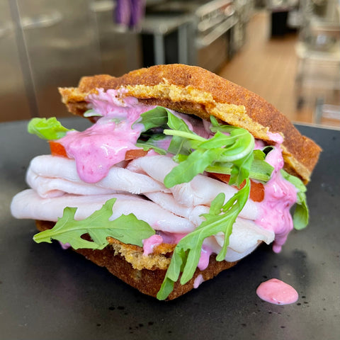 BACK! Everything but the Stuffing Cornbread Waffle Turkey Sandwich with Cranberry Aioli and Broccoli Slaw