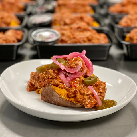 BACK! Healthy Turkey Sloppy Joe Stuffed Sweet Potato with Pickled Onions and Peppers (on the side)